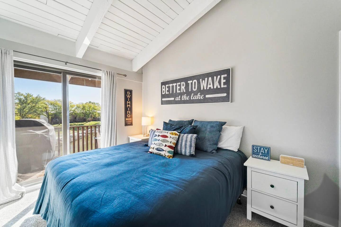 Bright, well-managed guest bedroom in a Stay-A-While rental — how to manage an airbnb