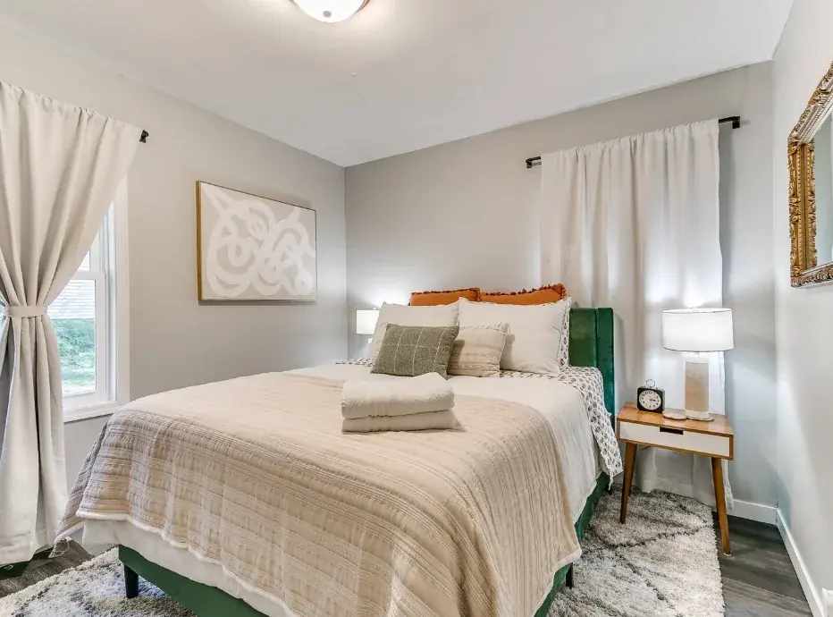 Host welcoming guests with local recommendations at a Central Iowa short-term rental — airbnb concierge