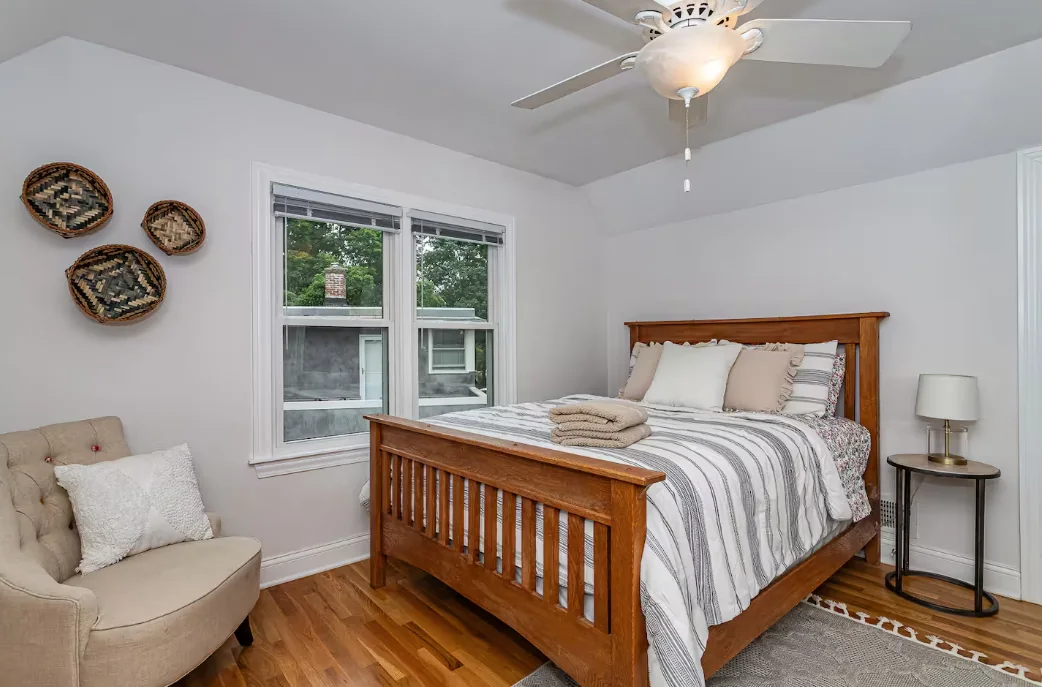 Tastefully furnished bedroom in a short-term rental — how to furnish an airbnb