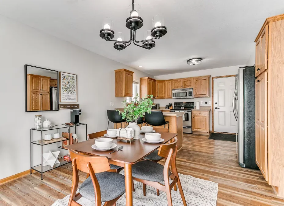 Dining area set for guests in a managed rental — how to screen airbnb guests